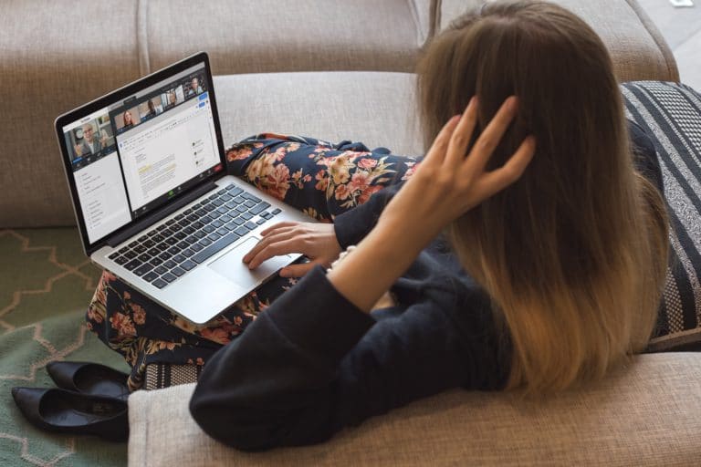 macbook-mockup-of-a-woman-working-on-a-sofa-a21507-768x512