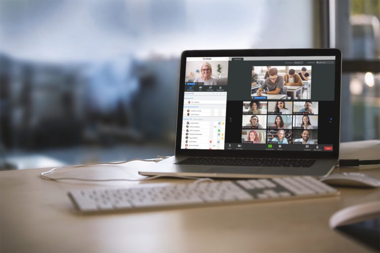 mockup-featuring-a-macbook-placed-on-a-desk-at-an-office-2441-el1-768x512