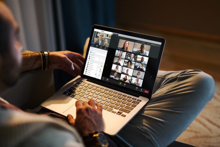 mockup-of-a-man-using-a-macbook-in-a-cozy-living-room-2324-el1-768x512